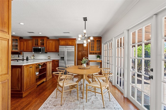 20315 Mid Ct, Lutz, FL 33558 - dining room with recessed lighting, an inviting chandelier, visible vents, and light wood-type flooring