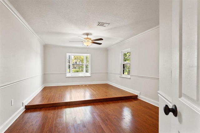 20315 Mid Ct, Lutz, FL 33558 - empty room with wood-type flooring, ceiling fan, baseboards, and a wealth of natural light