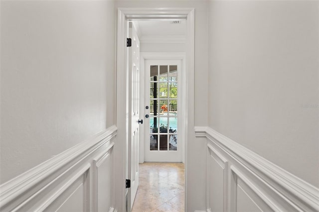 20315 Mid Ct, Lutz, FL 33558 - corridor featuring wainscoting, ornamental molding, and a decorative wall