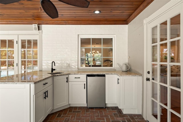20315 Mid Ct, Lutz, FL 33558 - interior space with wood ceiling, a sink, and brick floor