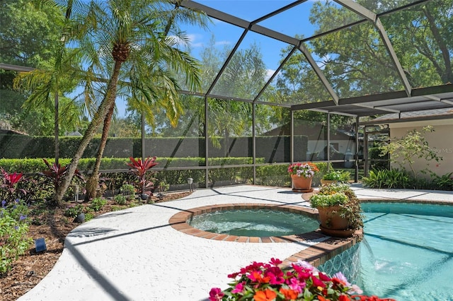 20315 Mid Ct, Lutz, FL 33558 - view of pool featuring a fenced in pool, a patio, an in ground hot tub, and a lanai