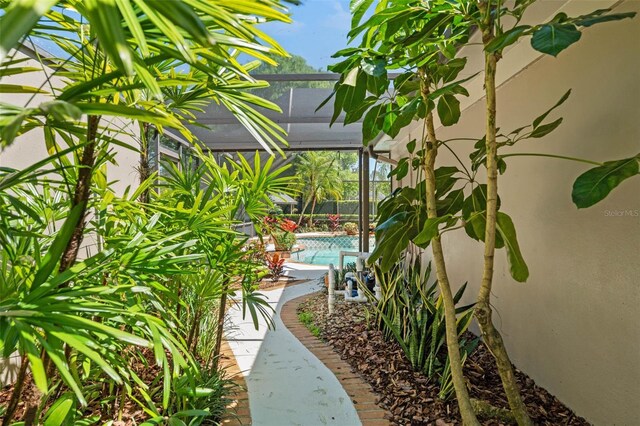 20315 Mid Ct, Lutz, FL 33558 - exterior space with a fenced in pool and a lanai