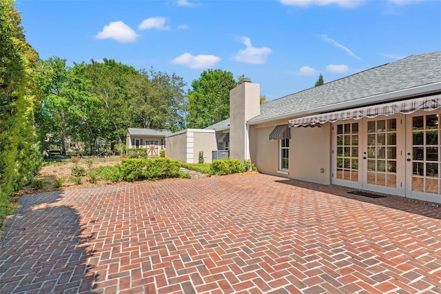 20315 Mid Ct, Lutz, FL 33558 - view of patio with french doors