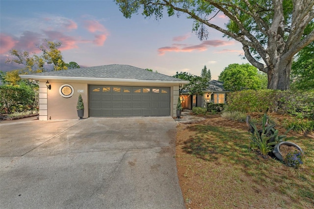20315 Mid Ct, Lutz, FL 33558 - single story home with concrete driveway, stucco siding, and a garage