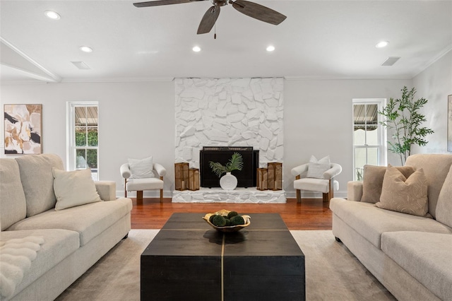 20315 Mid Ct, Lutz, FL 33558 - living area with recessed lighting, ornamental molding, light wood-style flooring, and ceiling fan