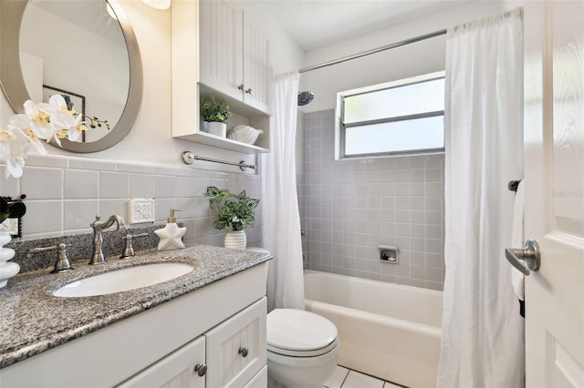 3818 W San Miguel St, Tampa, FL 33629 - full bathroom with tile walls, shower / bath combo, toilet, vanity, and backsplash