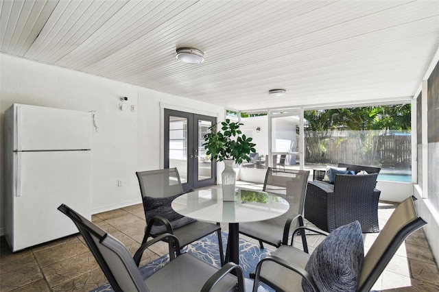 3818 W San Miguel St, Tampa, FL 33629 - exterior space with fence, outdoor dining area, and french doors