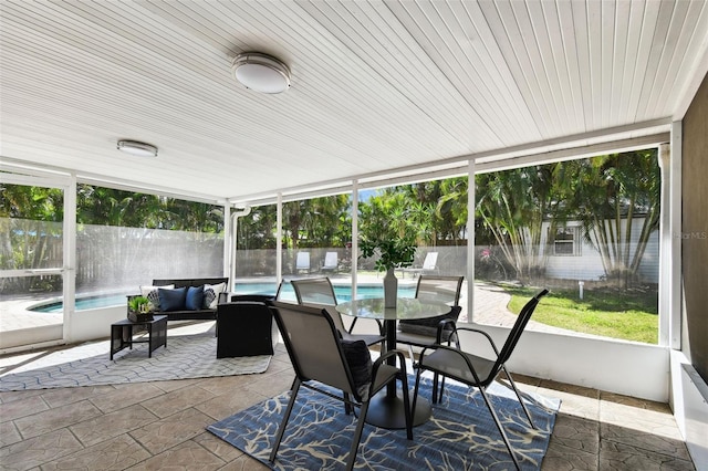 3818 W San Miguel St, Tampa, FL 33629 - sunroom with an outdoor hangout area