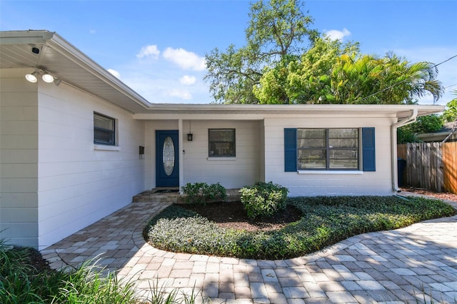 3818 W San Miguel St, Tampa, FL 33629 - entrance to property featuring concrete block siding and fence