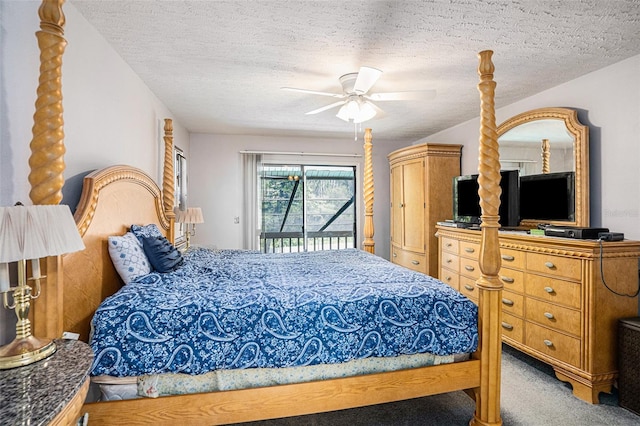 bedroom with a ceiling fan, access to exterior, carpet flooring, and a textured ceiling