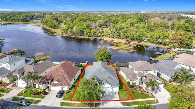 2327 Shirecrest Cove Way, Lutz, FL 33558 - aerial view of residential area featuring a large body of water and property parcel outlined