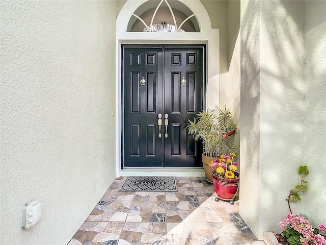 2327 Shirecrest Cove Way, Lutz, FL 33558 - doorway to property with stucco siding