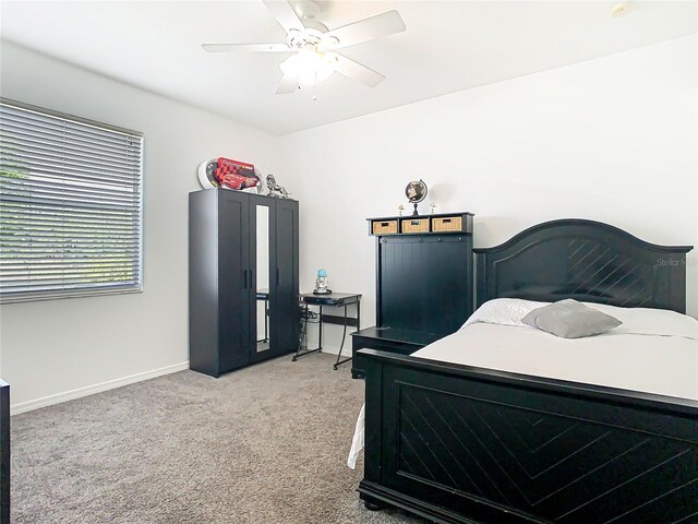 2327 Shirecrest Cove Way, Lutz, FL 33558 - bedroom with light colored carpet and a ceiling fan