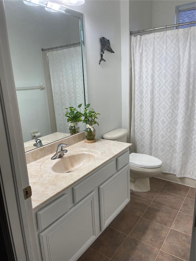 2327 Shirecrest Cove Way, Lutz, FL 33558 - bathroom featuring vanity, tile patterned flooring, and a shower with shower curtain