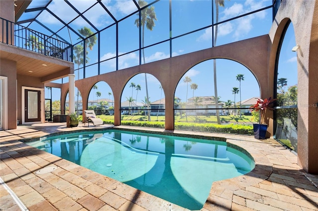 outdoor pool featuring a patio