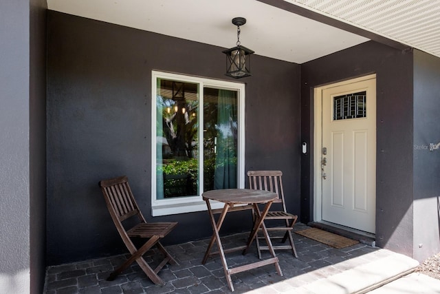 1828 Stancel Dr, Clearwater, FL 33764 - view of exterior entry with stucco siding