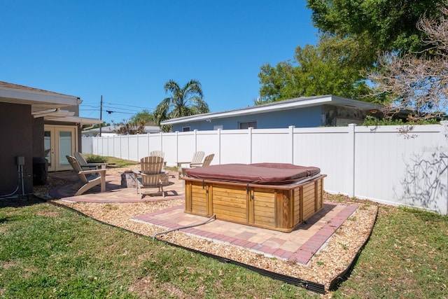 1828 Stancel Dr, Clearwater, FL 33764 - view of yard with a patio, a fenced backyard, and a hot tub