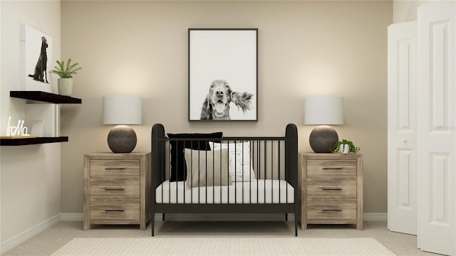 bedroom with baseboards and carpet flooring