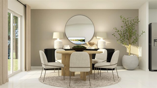 dining area with tile patterned floors and baseboards