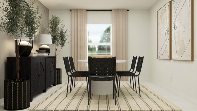 dining room with baseboards