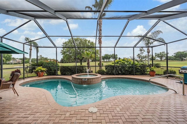 pool featuring a lanai and a patio area