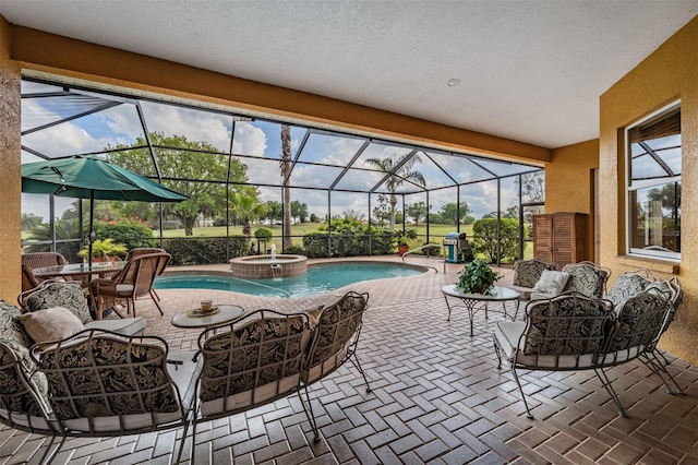 view of swimming pool with glass enclosure, outdoor lounge area, and a patio area