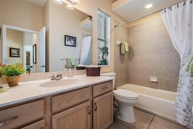 bathroom featuring tile patterned floors, vanity, toilet, and shower / bathtub combination with curtain