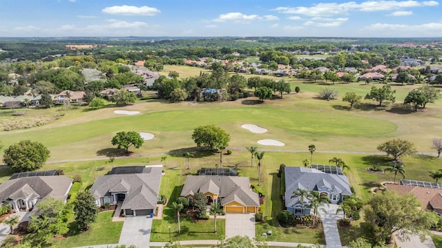 bird's eye view featuring view of golf course and a residential view