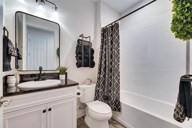 full bathroom featuring toilet, shower / bath combo, and vanity