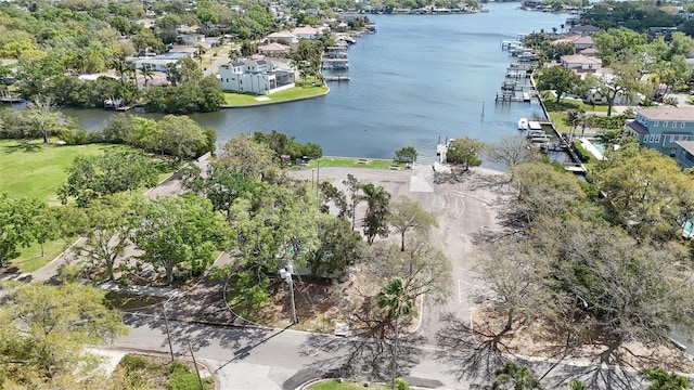 drone / aerial view with a residential view and a water view
