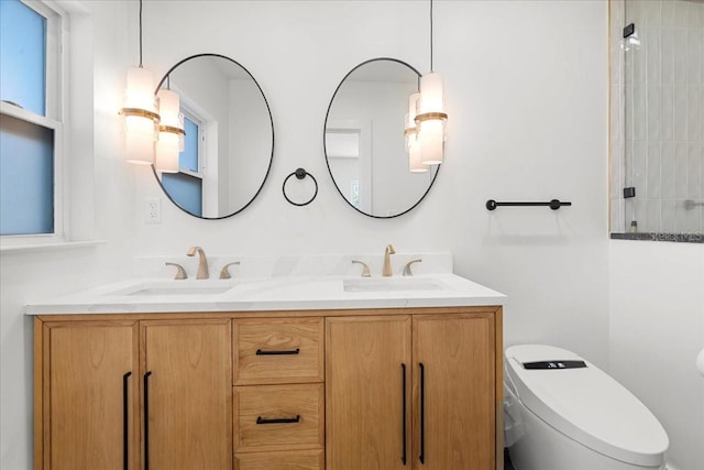 6531 2nd Ave N, Saint Petersburg, FL 33710 - bathroom with tiled shower, a sink, double vanity, and toilet