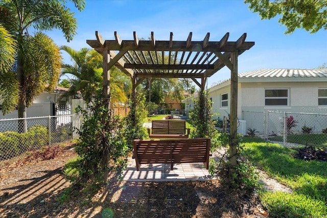 6531 2nd Ave N, Saint Petersburg, FL 33710 - view of yard with a pergola, fence, and a patio area