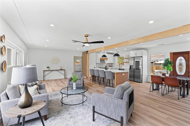 6531 2nd Ave N, Saint Petersburg, FL 33710 - living area with light wood-style flooring, a ceiling fan, and recessed lighting