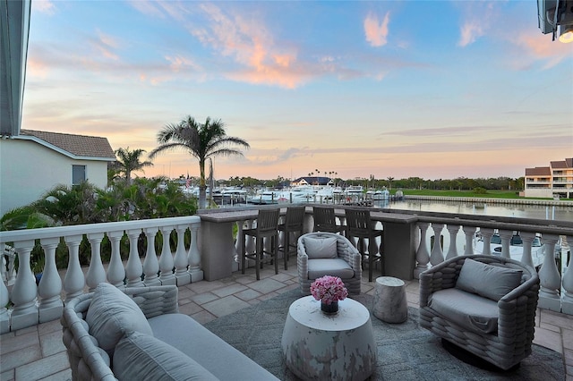 6113 Pasadena Point Blvd, Gulfport, FL 33707 - view of patio with a water view and outdoor lounge area