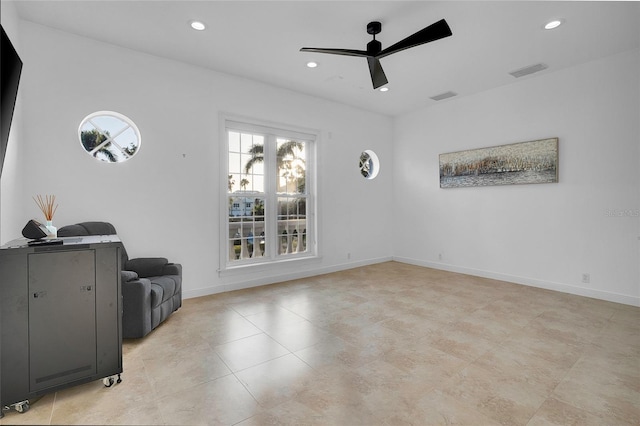 6113 Pasadena Point Blvd, Gulfport, FL 33707 - sitting room with ceiling fan, recessed lighting, and light tile patterned flooring