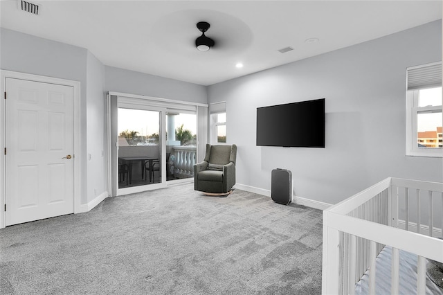 6113 Pasadena Point Blvd, Gulfport, FL 33707 - living area with carpet flooring and baseboards