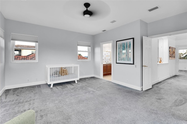 6113 Pasadena Point Blvd, Gulfport, FL 33707 - unfurnished bedroom with carpet and ensuite bathroom