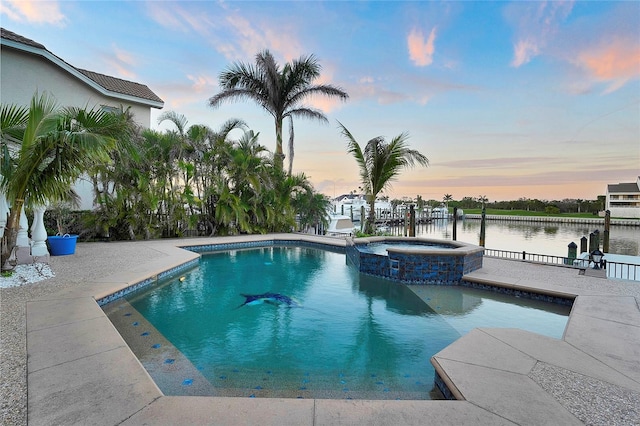 6113 Pasadena Point Blvd, Gulfport, FL 33707 - view of swimming pool with a water view and a pool with connected hot tub