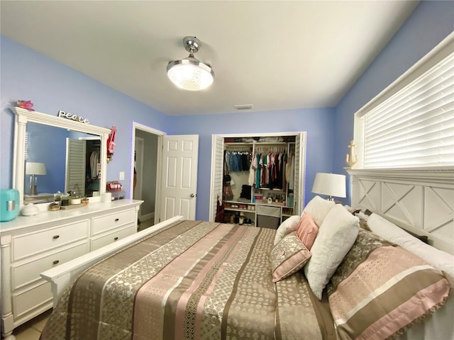 bedroom featuring a closet and visible vents