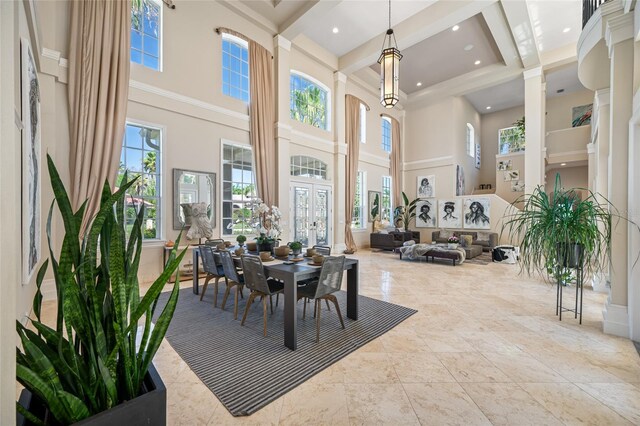 19005 Cour Ests, Lutz, FL 33558 - dining area featuring a high ceiling, healthy amount of natural light, recessed lighting, and beamed ceiling