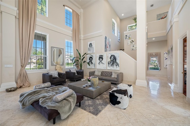 19005 Cour Ests, Lutz, FL 33558 - living area with a high ceiling, baseboards, and decorative columns