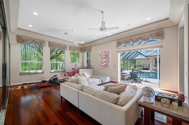 19005 Cour Ests, Lutz, FL 33558 - living room featuring plenty of natural light, wood finished floors, a ceiling fan, recessed lighting, and baseboards