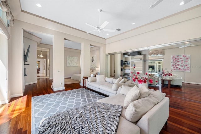 19005 Cour Ests, Lutz, FL 33558 - living room with ceiling fan, baseboards, hardwood / wood-style floors, and recessed lighting