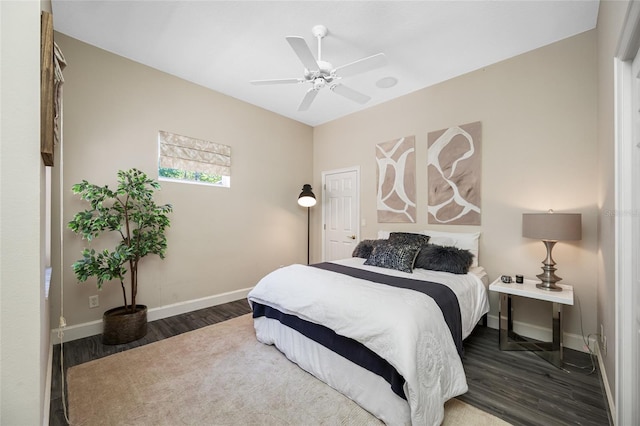 19005 Cour Ests, Lutz, FL 33558 - bedroom featuring wood finished floors, baseboards, and a ceiling fan