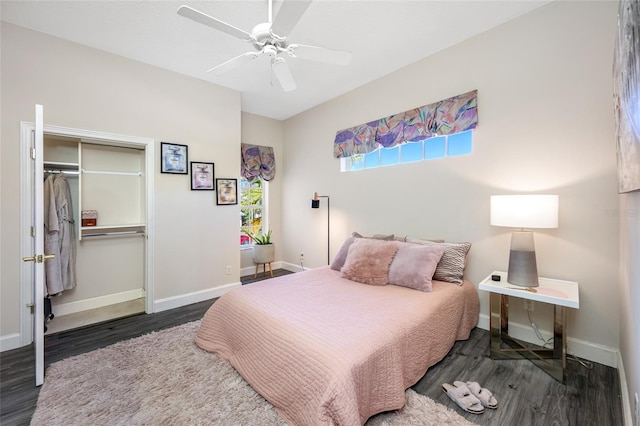 19005 Cour Ests, Lutz, FL 33558 - bedroom featuring wood finished floors, a closet, baseboards, and a ceiling fan