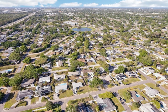 1901 66th Ave N, Saint Petersburg, FL 33702 - aerial overview of property's location with a large body of water and nearby suburban area