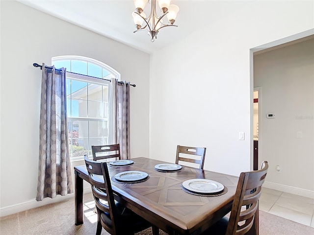 5235 SE 91st St, Ocala, FL 34480 - dining area with a wealth of natural light, a notable chandelier, light colored carpet, and baseboards