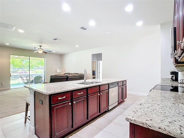 5235 SE 91st St, Ocala, FL 34480 - kitchen with open floor plan, visible vents, reddish brown cabinets, and a sink