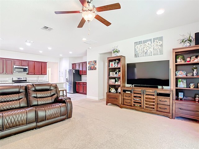 5235 SE 91st St, Ocala, FL 34480 - living area featuring visible vents, baseboards, light carpet, recessed lighting, and a ceiling fan