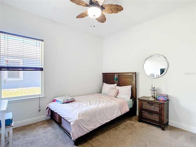 5235 SE 91st St, Ocala, FL 34480 - bedroom featuring baseboards, light colored carpet, and a ceiling fan